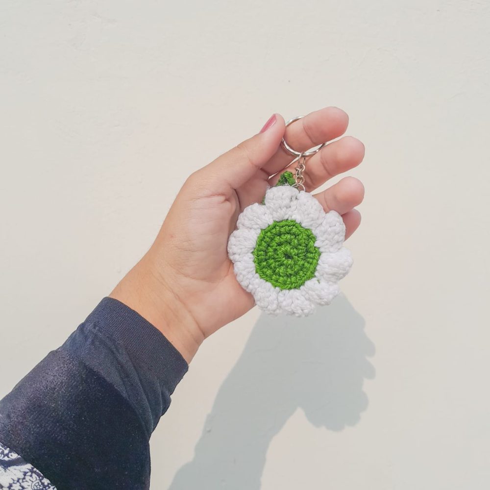 Green crochet flower keychain