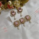 Pink necklace with matching earrings