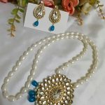 Blue necklace with matching earrings